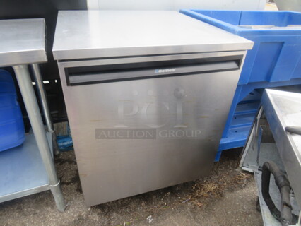 One SS Delfield Worktop Freezer With 1 Rack On Casters. Model# 407. 115 Volt. 27X28.5X34.5