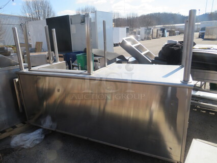 One STainless Steel Kiosk With 1 Door Cooler, Hand Sink, Cash Drawer, Work Area, SS Flip Up Side Table, 240 Volt Breaker Box, Ariston Hot Water Heater, 4 Doors For Storage, On Casters. 85X35X61