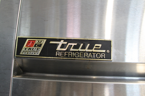 2015 True TG2R-2S ENERGY STAR Stainless Steel Commercial Two Door Reach In Cooler w/ Poly Coated Racks on Commercial Casters. 115 Volts, 1 Phase. Tested and Working! - Image 3 of 9