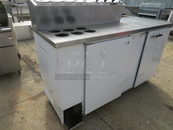 One Beverage Air 2 Door Refrigerator With 2 Racks, And A Cold Rail On Top With 9 Topping Containers And Lids And 6 Round Cylinders, On Casters. Working NOT Cold.  Model# MS68. 115 Volt. 69X28X50.5 - Image 4 of 5