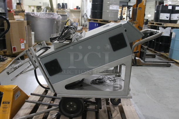 Gray Metal Commercial Unit w/ SealMaster SFT-10 5/8 Bolt Flange on Casters. - Image 1 of 9