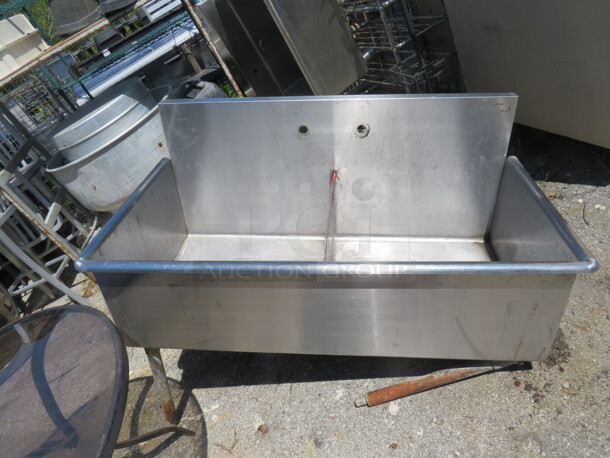 One Stainless Steel Double Sink. 2 Legs Need To Be Welded, And 1 Seam Needs To Be Welded. 52X27X42 - Image 1 of 3