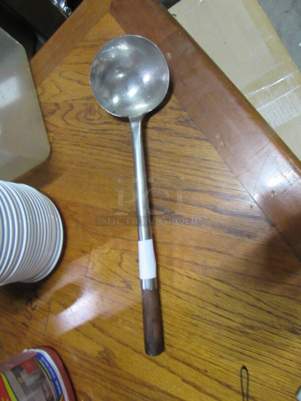 One Stainless Steel Long Handle Ladle. 