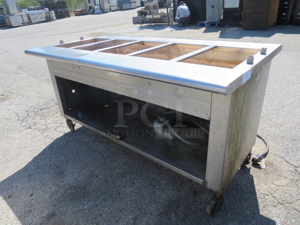 One Stainless Steel 5 Well Electric Steam Table With Under Shelf, On Casters. Model# WBHT-500. 208 Volt. 1 Phase. 72X37.5X36