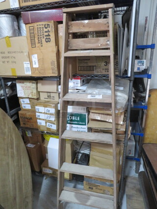 One 6 Ft Louisville Wooden Ladder.