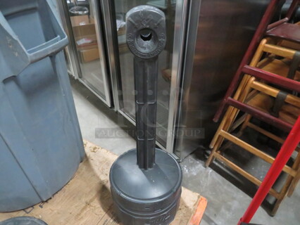 One Smokers Cease Fire Cigarette Receptacle.