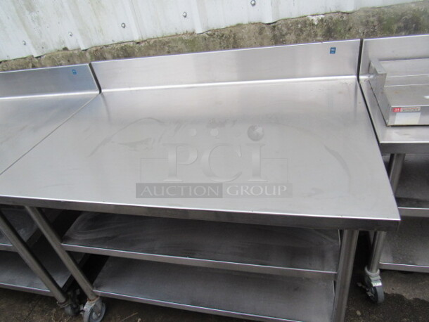 One Stainless Steel Table With 2 Stainless Under Shelves, On Casters. 48X32X40 - Image 2 of 2