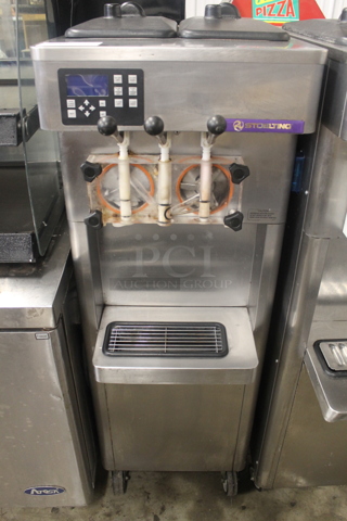 2011 Stoelting F231-18I2-OT2 Stainless Steel Commercial Floor Style Water Cooled 2 Flavor w/ Twist Soft Serve Ice Cream Machine on Commercial Casters. 208-240 Volts, 1 Phase. 