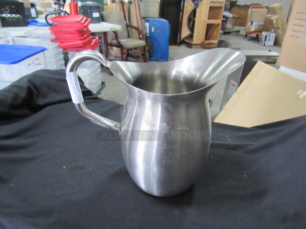 One Vollrath Stainless Steel Pitcher.