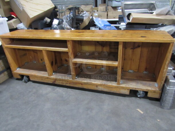 One Solid Wood Organization Counter With Storage And Shelves On Casters. 