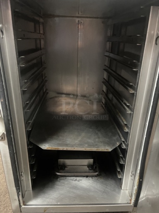 FWE HLC-8 Undercounter Insulated Mobile Heated Cabinet w/ (8) Pan Capacity, 120v The FWE HLC-8 undercounter insulated heated cabinet is positioned on 31⁄2-inch casters to provide mobility, and these casters swivel to help employees maneuver turns. It's made of durable stainless steel, and the exterior is polished smooth to facilitate cleaning. The door opens and closes on die-cast hinges and has a magnetic handle with no extruded parts that could get in the way. This cabinet is designed for undercounter use, measuring 17 inches wide by 26.50 inches deep by 33.50 inches high. Tested and Working! - Image 7 of 7
