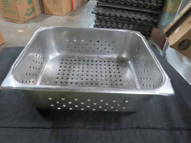 One 1/2 Size 4 Inch Deep Perforated Hotel Pan.
