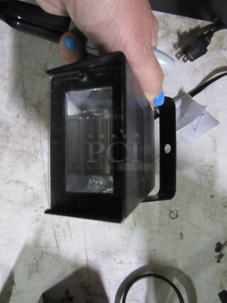 One Flashing Strobe Light. 120 Volt.
