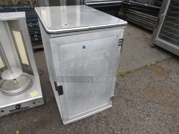 One Bruner Aluminum Holding Cabinet. 23X32X37