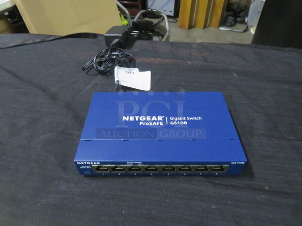 One Netgear Pro Safe Gigabit Switch. #GS108