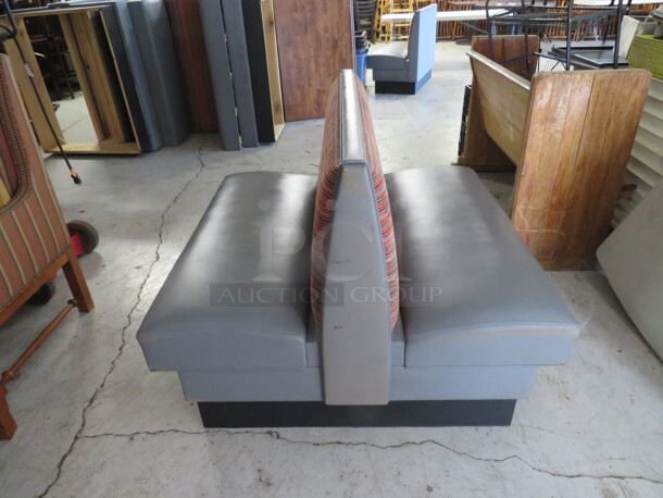 One Double Sided Booth With Blue Cushioned Seat And Multi Color Back. 48X48X36 - Image 1 of 1