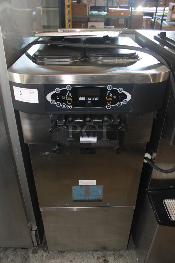 2012 Taylor C723-33 Stainless Steel Commercial Water Cooled Floor Style 2 Flavor w/ Twist Soft Serve Ice Cream Machine on Commercial Casters. 208-230 Volts, 3 Phase.