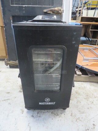 One Masterbilt Electric Smoker. With Manual. 17X20X29 