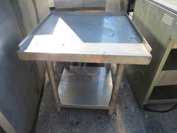 One Stainless Steel Equipment Table With SS Under Shelf. 24X4X25.5