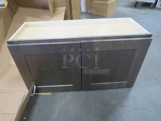 One NEW Echelon Maple 2 Door Wall Cabinet In A Storm Finish. #W3318BD.
