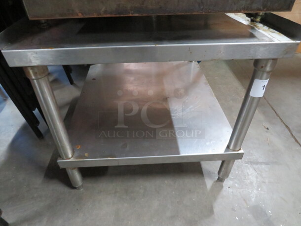 One Stainless Steel Equipment Table With SS Under Shelf. 24.5X30X24