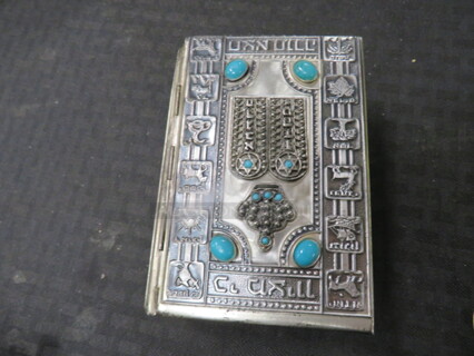 One Silver /Turquoise Book.