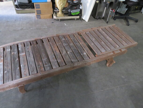 One Adjustable Wooden Chaise Lounger With 2 Wheels, And A Pullout Shelf. Needs A Lil Adjusting. No SH
helf 72X23 - Image 2 of 2