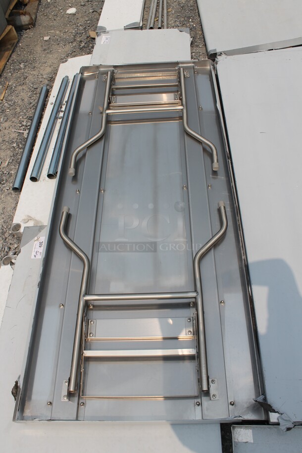 BRAND NEW SCRATCH AND DENT! Regency 600FWT3072 Commercial Stainless Steel Open Base Folding Work Table - Image 4 of 4