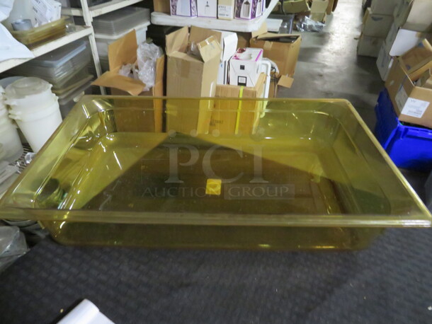One NEW Vollrath Full Size 4 Inch Deep Amber Food Storage Container. #5366505 - Image 1 of 1