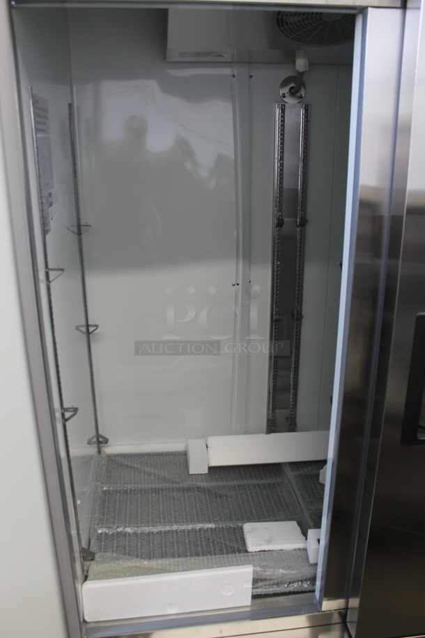 BRAND NEW SCRATCH AND DENT! Avantco A-49R-HC 54" Solid Double Door Stainless Steel Reach-In Refrigerator. 115V. Tested and Working! - Image 4 of 9
