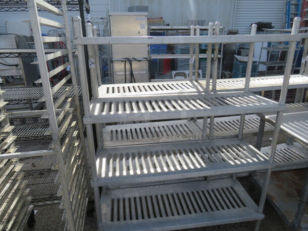One Metal Shelving System  With 4 Shelves. 48X18X61 - Image 1 of 1