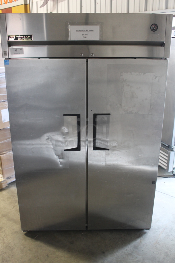 2013 True TG2R-2S Commercial Stainless Steel 2 Solid Door Reach-In Cooler With Plycoated Shelves And Commercial Casters. 115V, 1 Phase. Tested and Working!
