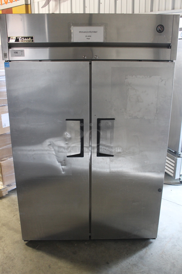 2013 True TG2R-2S Commercial Stainless Steel 2 Solid Door Reach-In Cooler With Plycoated Shelves And Commercial Casters. 115V, 1 Phase. Tested and Working! - Image 1 of 7