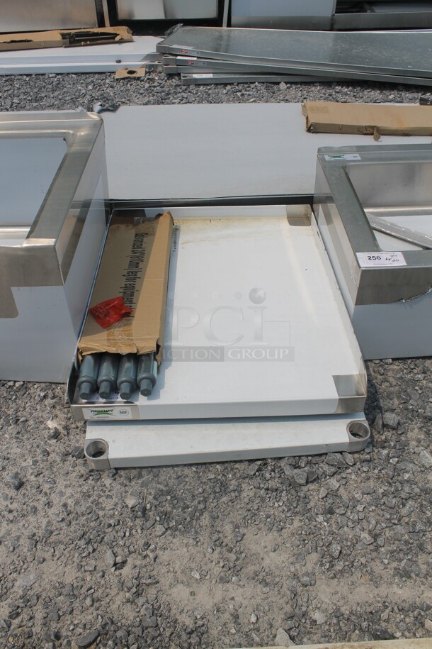 BRAND NEW SCRATCH AND DENT! Regency 600ES3024G Commercial Stainless Steel Disassembled Equipment Stand With Undershelf And Galvanized Legs - Image 1 of 4