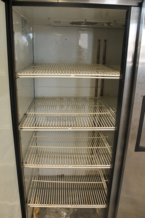 2013 True TG2R-2S ENERGY STAR Stainless Steel Commercial 2 Door Reach In Cooler w/ Poly Coated Racks on Commercial Casters. 115 Volts, 1 Phase. Tested and Working! - Image 2 of 8