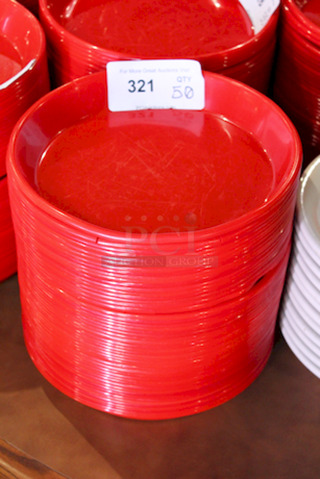 HUGE STACK! 11" Red Round Plastic Serving Platters. 
11x1-1/2
50x Your Bid