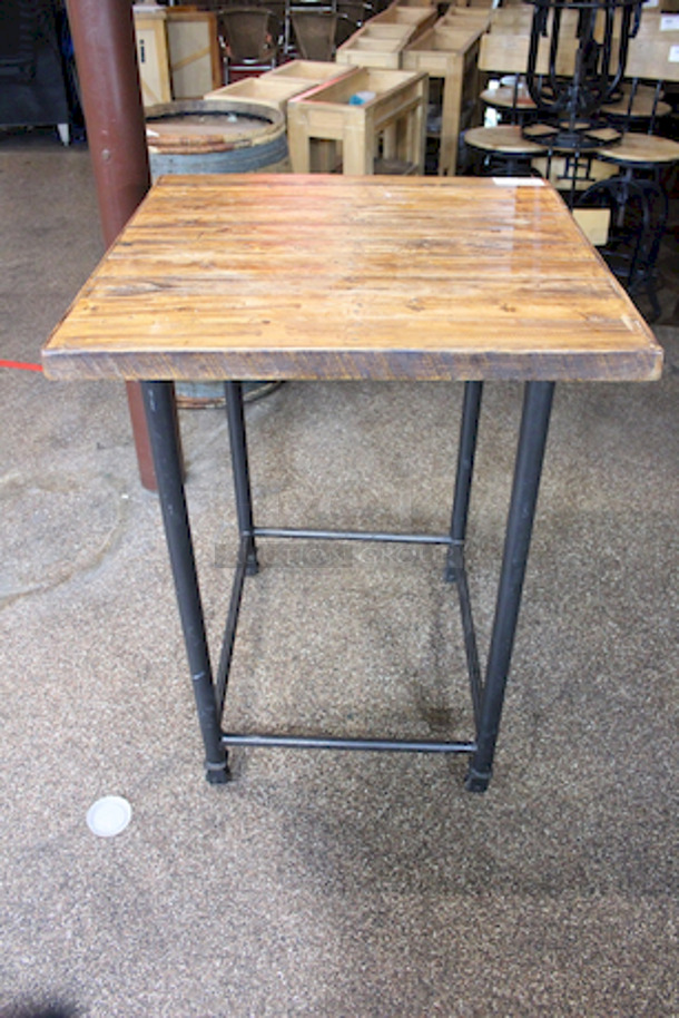 HEAVY DUTY! Industrial Style, Solid Wood Table On Steel Frame With Steel Casters. 
33x33x41-1/2