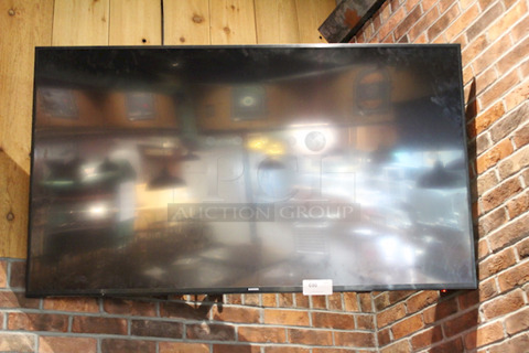 NICE SETUP! 70" Samsung Flat Screen TV With Mount.
Winner Responsible For Removal.