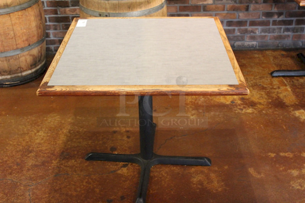 SOLID! High Quality Wood table Top With Cast Iron Base. 
34x34x29-1/2