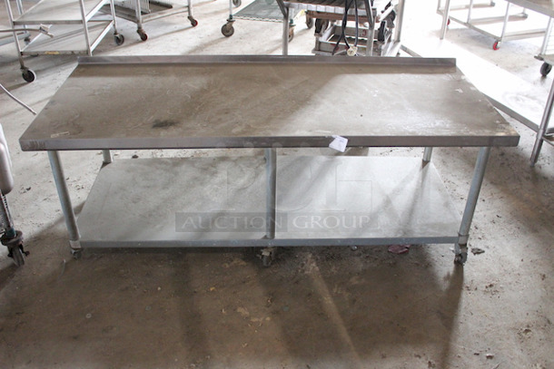 DO NOT PASS ON THIS!! Allstrong WT-3072-C  (1) Shelf Work Table Stainless Steel Top With 2" Flanged On All Edges. Standard Under-Shelf - Stainless Steel With 1-1/2" Flanged Edges.30"	72"	35" - Image 1 of 9