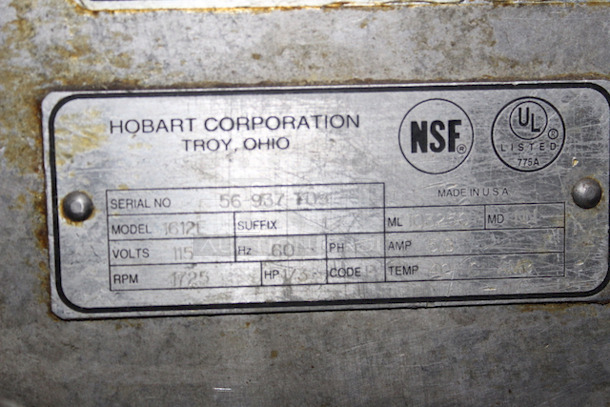 SOLID! Hobart 1612E Deli Slicer, Working When Tested Slice Thickness: 1 1/4". Knife Diameter: 11 3/4". Capacity: Food up to 12"W or 7 1/2" in diameter. Volts: 115. Hertz: 60. Single Phase. Amps: 4.5. Horse Power: 1/4; 23-5/8"W x 26-1/4"D x 21-1/4"H - Image 3 of 4