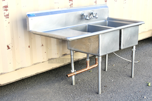 OUTSTANDING! 62” (2) Compartment Sink With Drainboard And Plumbing. Compartment Dimensions 17x23x12. Overall Dimensions 62x28x44 - Image 2 of 5