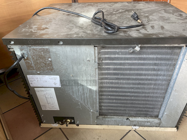 AMAZING! Manitowoc SY0454A Ice Maker, Air-Cooled.  Tested. In working Order.   Condition: 9/10  PRODUCTION : 460 lbs/day  Cube Size	Half Dice: 3/8" x 1-1/8" x 7/8"  DIMENSIONS : W30" x D24.5" x H21.5"  115v/60Hz/1-Ph/13.6 Amps  WEIGHT : 160 lbs - Image 2 of 2