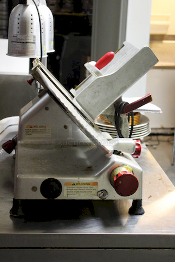 Berkel 827A 12" Manual Gravity Feed Meat Slicer - 1/2 hp, 4 Amps/60 Hz/1 Ph/115 V/460 W, 
24 Inches x 21 1/2 Inches x 21 1/4 Inches - Image 2 of 5