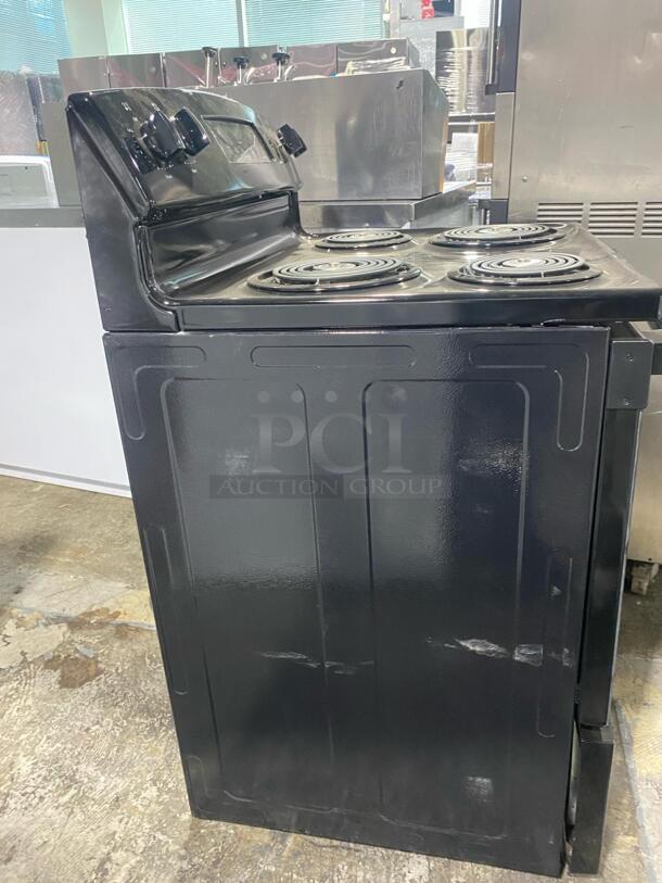 GE 30 Inch Freestanding Electric Range with 4 Coil Burners, 5.0 cu. ft. Oven Capacity, Storage Drawer, Sensi-Temp Technology, Dual-Element Bake, Sabbath Mode, and Self-Clean: Black
 - Image 2 of 4