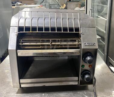 Adcraft CVYT-120 Countertop Commercial Conveyor Toaster, 300 Slices/Hour, Stainless Steel, 120v, NSF, 13-1/2'H x 14-1/2'W x 19-1/2'D.
