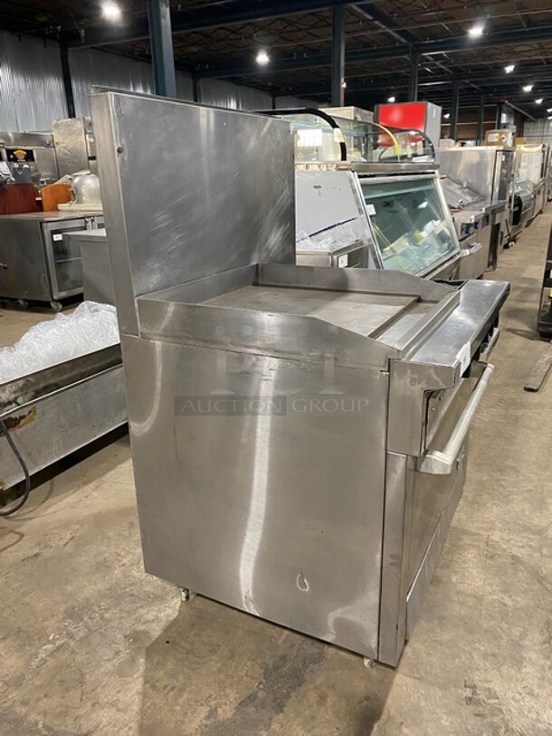 Therma-Tek Natural Gas Powered 2 Burner Range Split Top With Flat Griddle & Oven Underneath! All Stainless Steel! With Back Splash! On Legs! Model TMDS36-24G-2-1N SN: 11K02659C!
 - Image 3 of 11