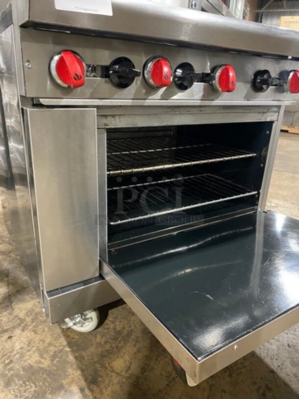 NICE!  American Range Natural Gas Powered 6 Burner Stove! With Full Size Oven Underneath! With Raised Back Splash And Salamander! All Stainless Steel! On Casters! Model: AR6 SN: 201215005 - Image 7 of 12