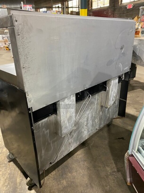 GREAT FIND! Garland Commercial Gas Powered 6 Burner Stove With Right Side Flat Griddle! Griddle Has Side Splashes! With Raised Back Splash And Salamander Shelf! With 2 Oven Underneath! Metal Oven Racks! All Stainless Steel! On Casters! Working When Removed! - Image 3 of 12