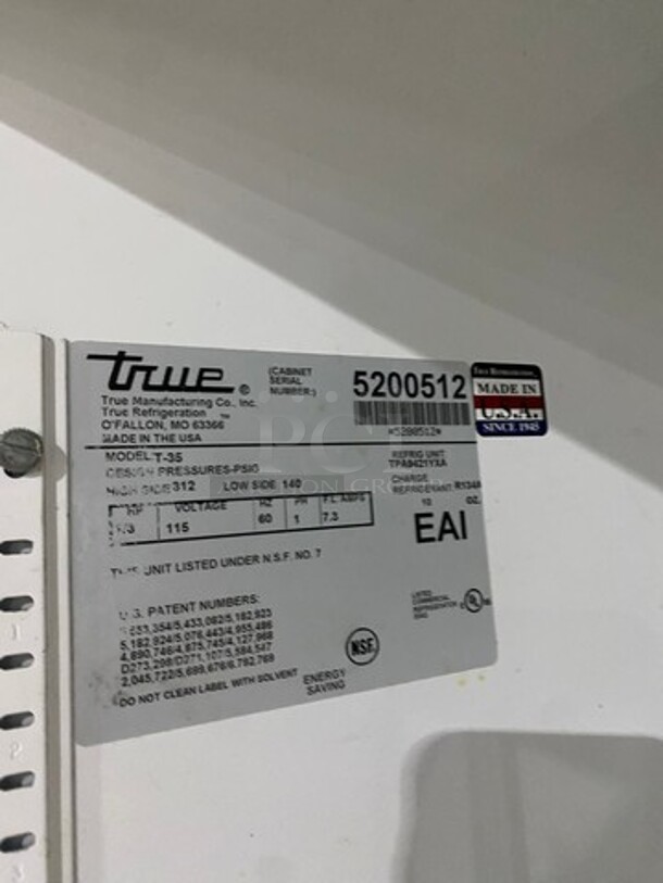 Nice! True Commercial 2 Door Reach In Refrigerator! With Poly Coated Racks! All Stainless Steel! On Casters! Working When Removed! Model: T35 SN: 5200512 115V 60HZ 1 Phase - Image 7 of 9